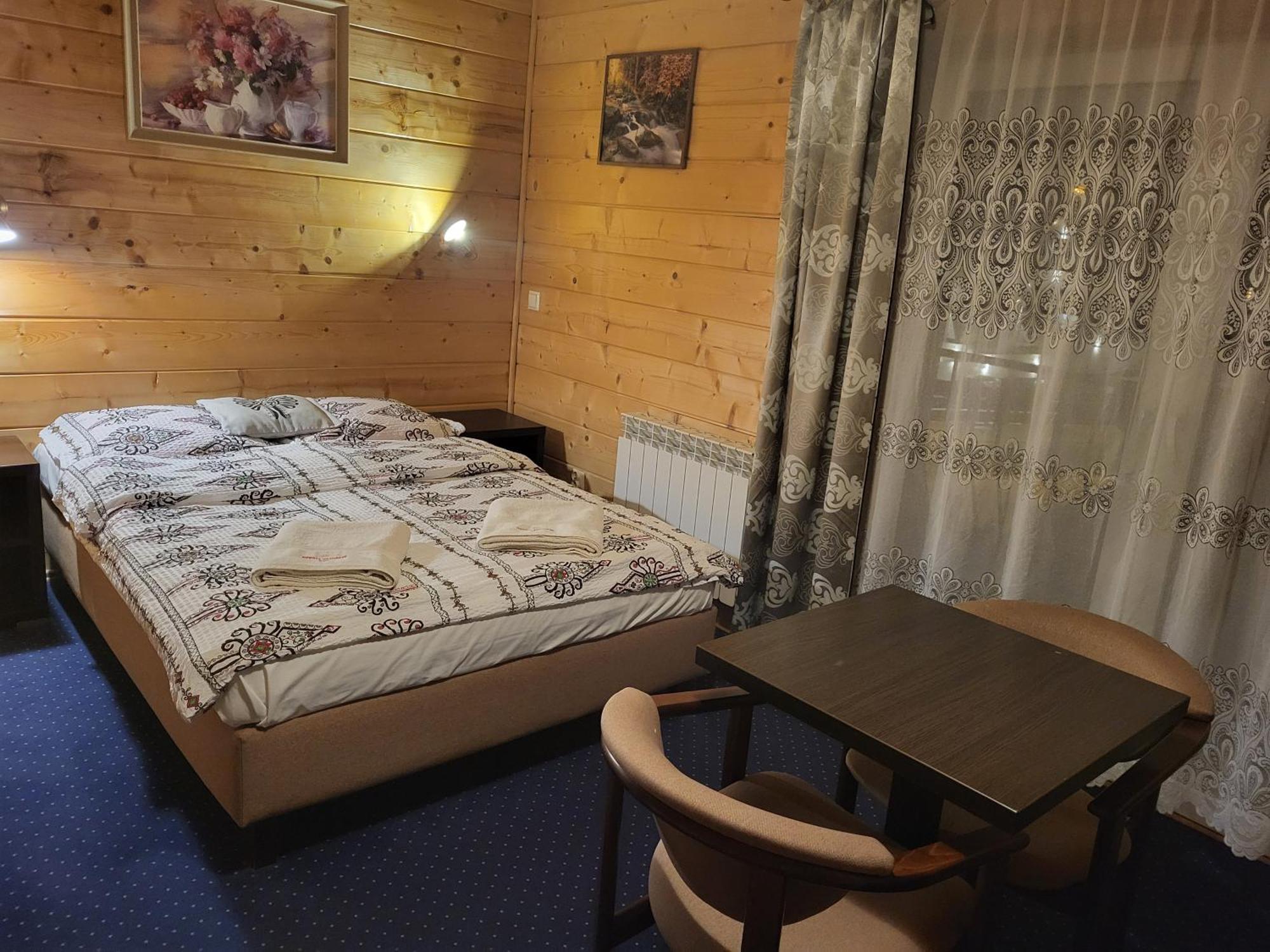 Apartamenty I Pokoje Goscinne Nowita Закопане Номер фото