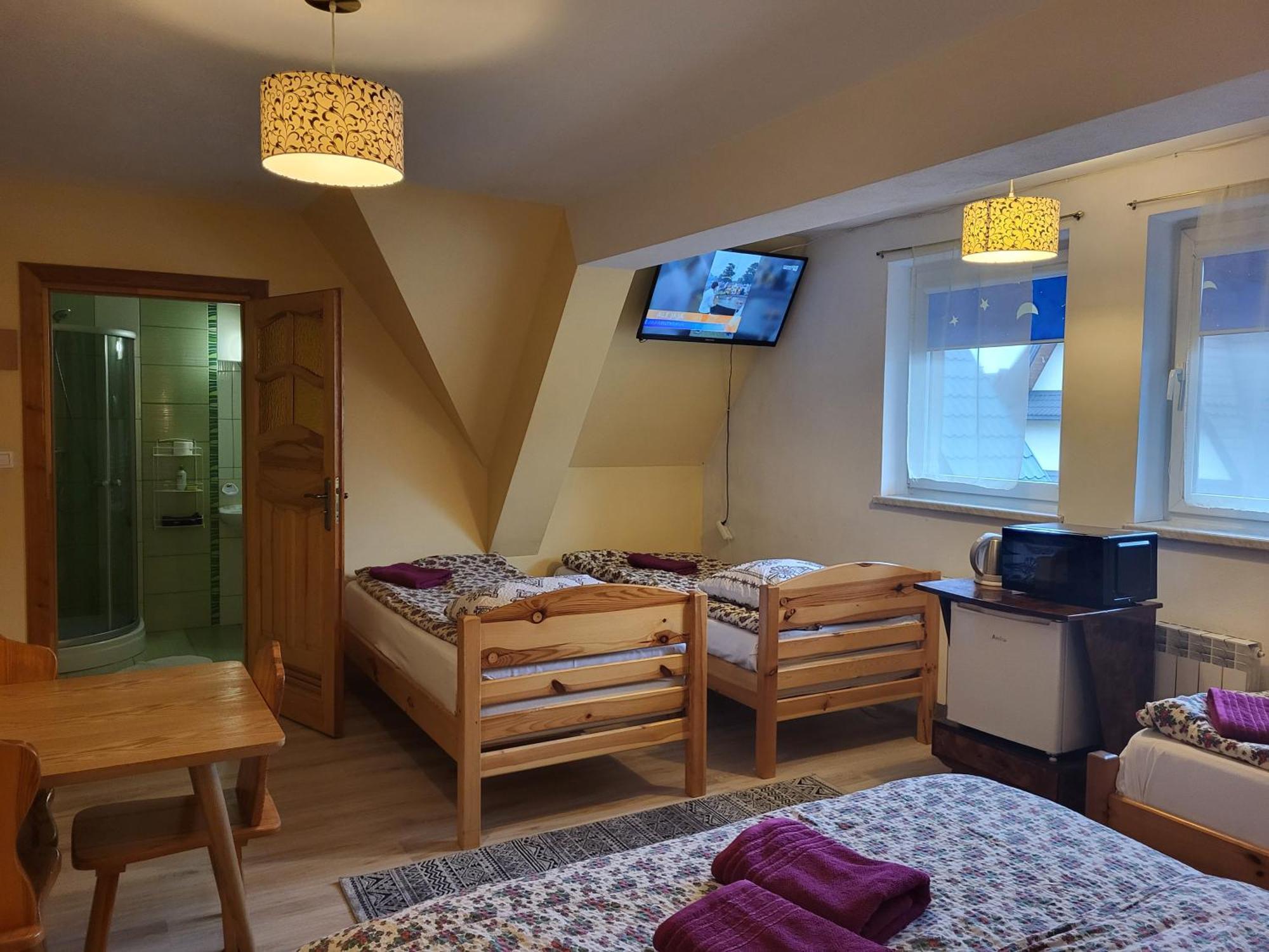 Apartamenty I Pokoje Goscinne Nowita Закопане Номер фото